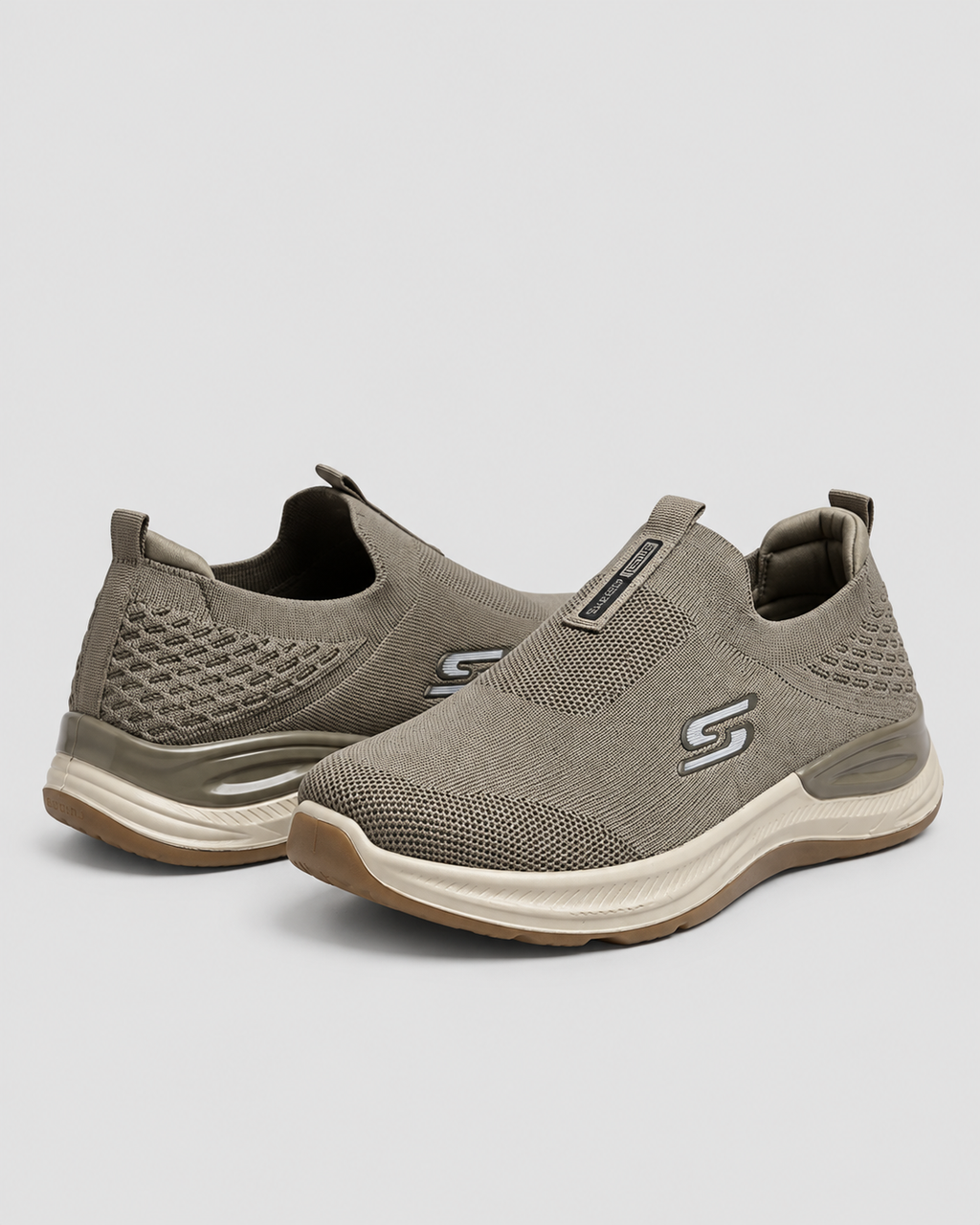 Olive Comfort Knit Slip-On Skechers — studio light grey background