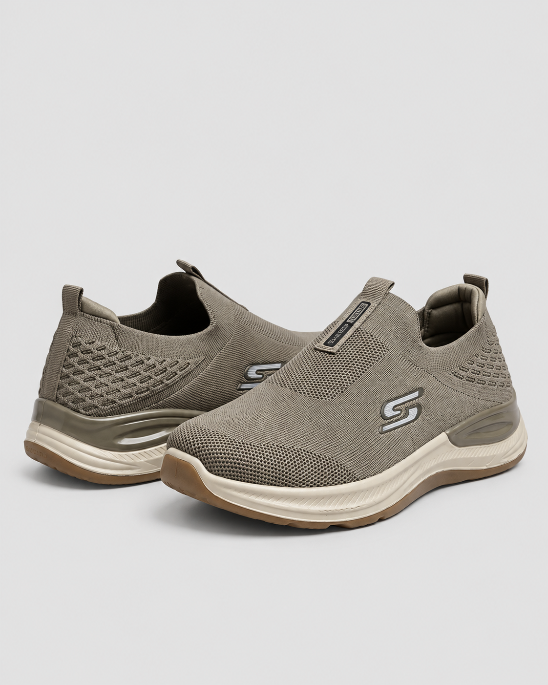 Olive Comfort Knit Slip-On Skechers — studio light grey background